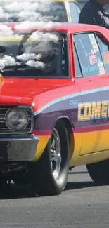 Vibrant red classic muscle car in a racing scene.