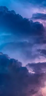 Vibrant blue and purple cloudy sky wallpaper for mobile.