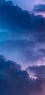 Vibrant cloudy sky mobile wallpaper in blue and purple hues.