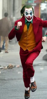 Vibrant clown in a red suit running on a street.