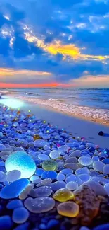 Vibrant coastal beach at sunset with colorful pebbles and a serene ocean view.