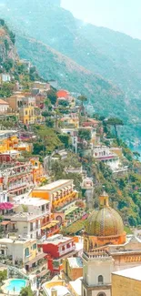 Colorful Mediterranean coastal town by the sea with vibrant buildings and scenic cliffs.