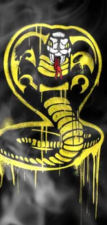 Vibrant yellow cobra design on a dark, smoky background wallpaper.