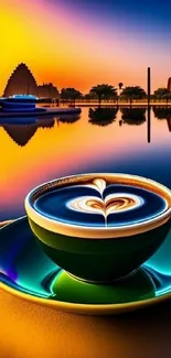 Cup of coffee with heart art against a vibrant sunset cityscape reflection.