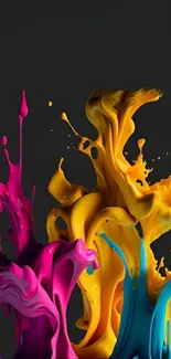 Vibrant color splash with pink, yellow, and blue paint on black background.