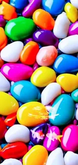 Colorful pebbles in vibrant hues creating a lively wallpaper design.