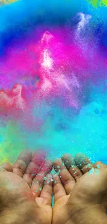 Hands releasing colorful powder into the air.