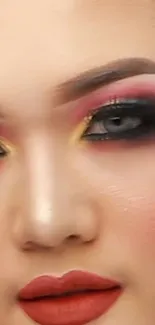 Close-up of colorful makeup portrait, highlighting vibrant eye makeup.