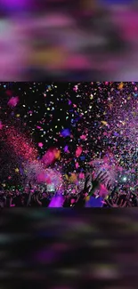 Energetic concert scene with colorful confetti showering from above.