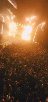 Crowded concert with bright stage lights and vibrant atmosphere.