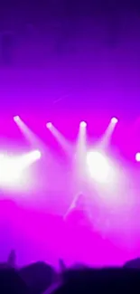 Vibrant purple and pink concert lights create a dynamic mobile wallpaper.