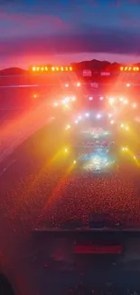 Vibrant concert scene with dazzling lights and lively crowd at night.
