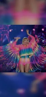 Vibrant pink and blue concert stage wallpaper with dynamic fringe outfit.