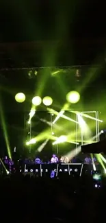 Concert stage with vibrant green lights