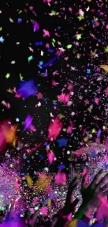 Vibrant confetti explosion during a live concert celebration, perfect for wallpaper.