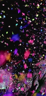 A vibrant confetti explosion with colorful stars and hands in celebration.