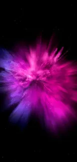 Vibrant cosmic burst with pink and blue hues on a black background.