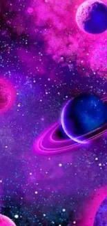 Vibrant pink and purple cosmic galaxy wallpaper with planets and stars.