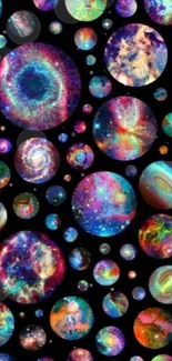 Colorful cosmic galaxy circles on a black background wallpaper.