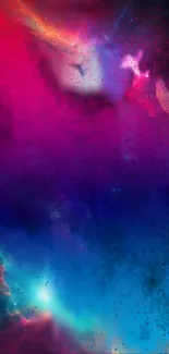 Vibrant magenta and blue cosmic galaxy wallpaper.