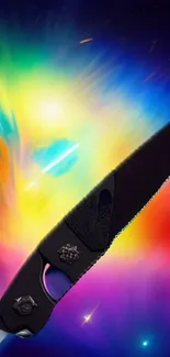 Black knife against a cosmic rainbow background.