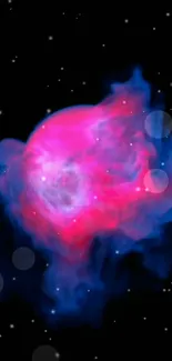 Vibrant cosmic nebula wallpaper with pink and blue hues against a starry background.