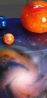 Vivid cosmic wallpaper with planets and galaxy design.