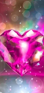 Vibrant pink crystal heart with sparkling effects on a mobile wallpaper.