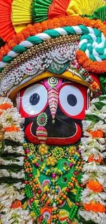 Colorful traditional mask adorned with floral designs.