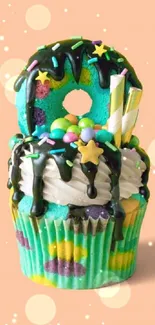 Vibrant cupcake with donut and sprinkles on peach background.