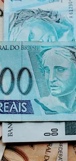 Vibrant Brasilian Real currency wallpaper in blue tones.