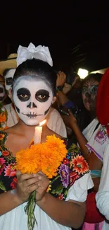 Day of the Dead celebration with colorful attire and face paint.