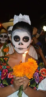 Day of the Dead celebration with face paint and marigolds.