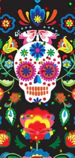 Colorful Dia de Muertos skull with vibrant floral patterns on a black background.