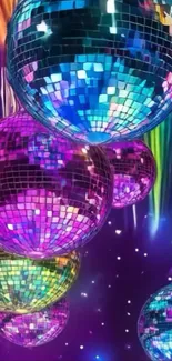 Vibrant disco balls with colorful lights on mobile wallpaper.