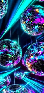 Colorful disco balls with vibrant neon lights.