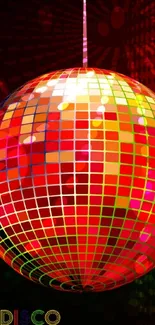 A dynamic disco ball with vibrant red tiles and colorful reflections.