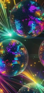 Multicolored disco balls with light streaks.