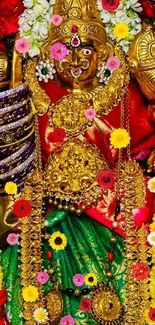 Vibrant goddess adorned in gold, surrounded by colorful flowers.