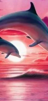 Dolphins jumping against a vibrant pink sunset over the ocean.