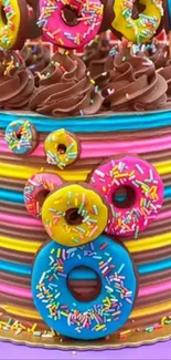 A colorful cake with vibrant donuts and sprinkles.