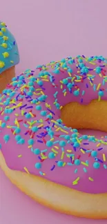 Colorful donuts on pastel pink background.