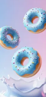 Blue frosted donuts splashing into milk with a colorful background.