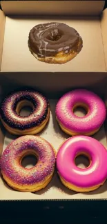 A box of colorful and glazed donuts as a mobile wallpaper.