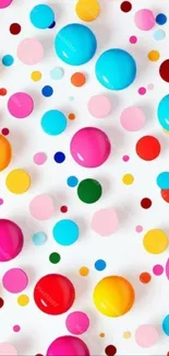 Lively wallpaper with colorful dots on a white background, creating a playful pattern.