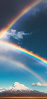 Double rainbow over mountain landscape, vibrant colors.