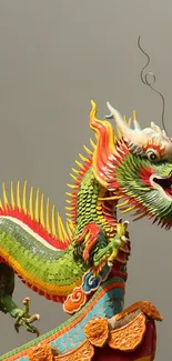 Colorful dragon sculpture on temple roof.