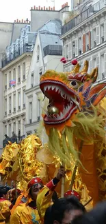 A vibrant dragon parade in city streets with golden costumes and urban backdrop.