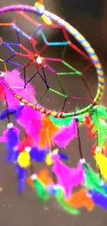 Vibrant dreamcatcher with colorful feathers.