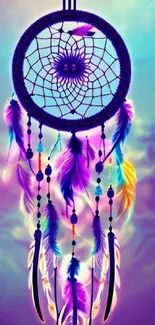 Vibrant dreamcatcher with purple feathers against a dreamy sky background.